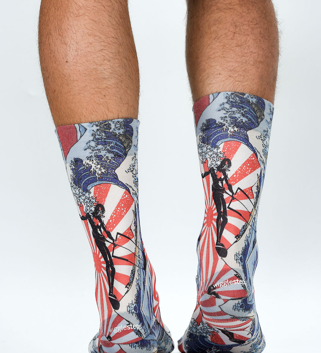 Colorful socks with vintage-style designs on a white background