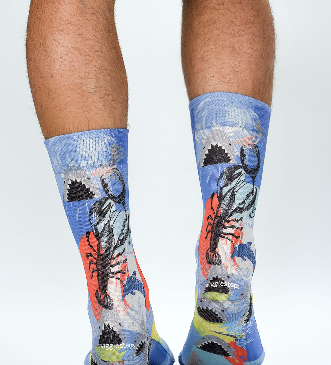 Colorful socks with abstract designs on a white background