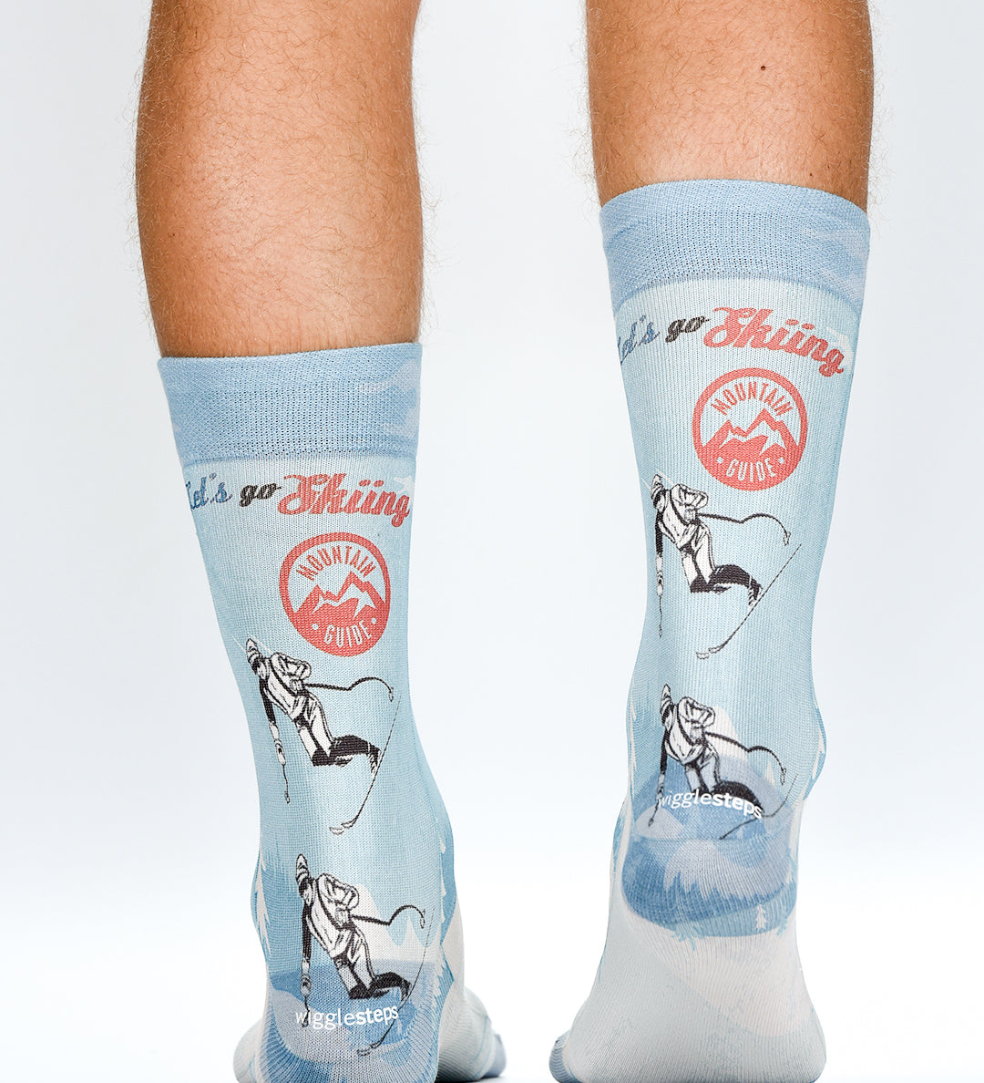 Light blue socks with skiing design and 'Go Skiing' text on a white background