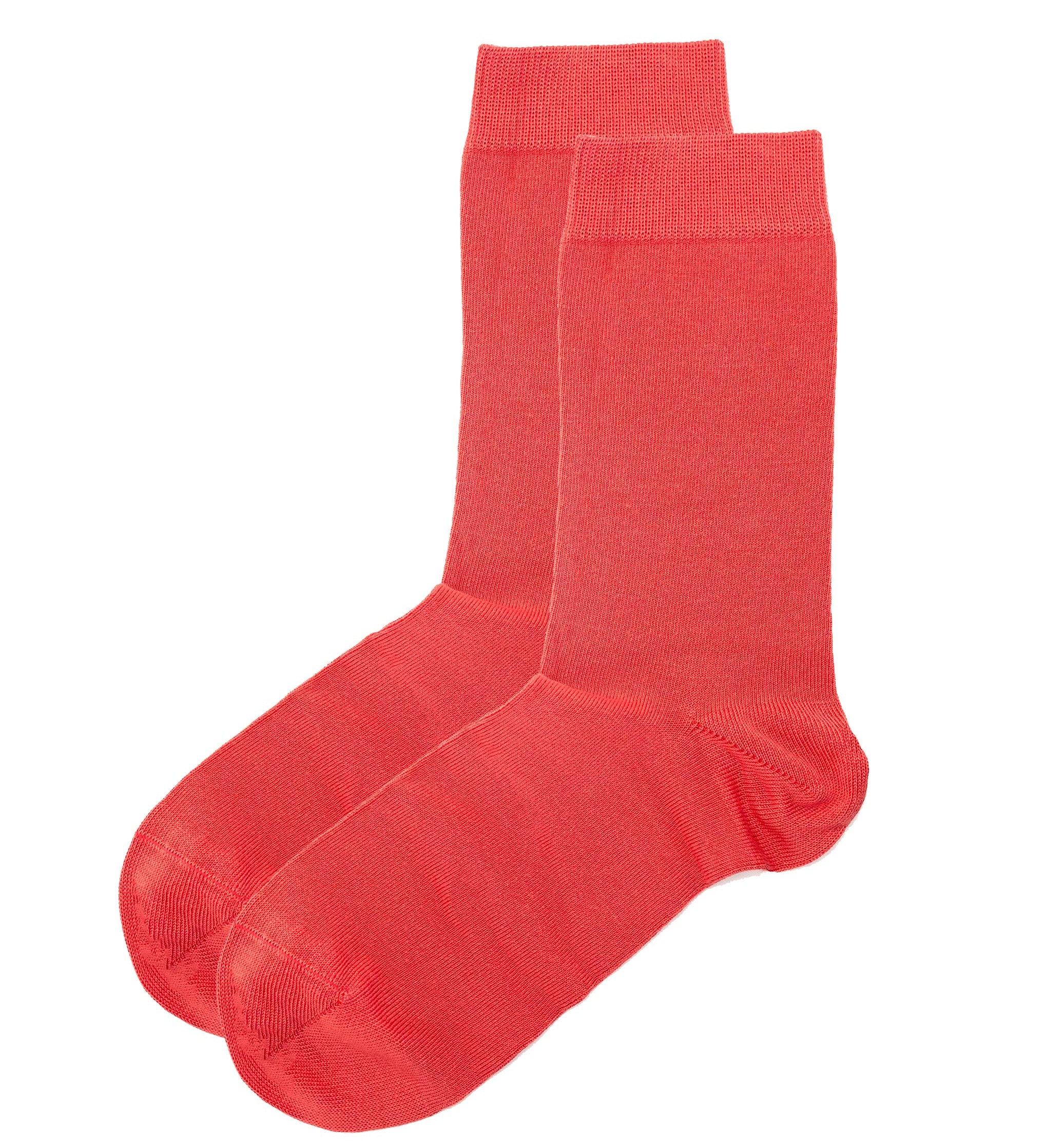 Pair of red dress socks on a white background
