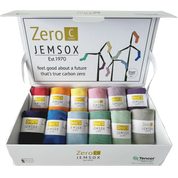 A box of Jemsox Carbon Zero socks, displaying multiple pairs of colorful socks inside the open box with the brand's logo and the phrase 'Feel good about a future that's true carbon zero' on the cover.