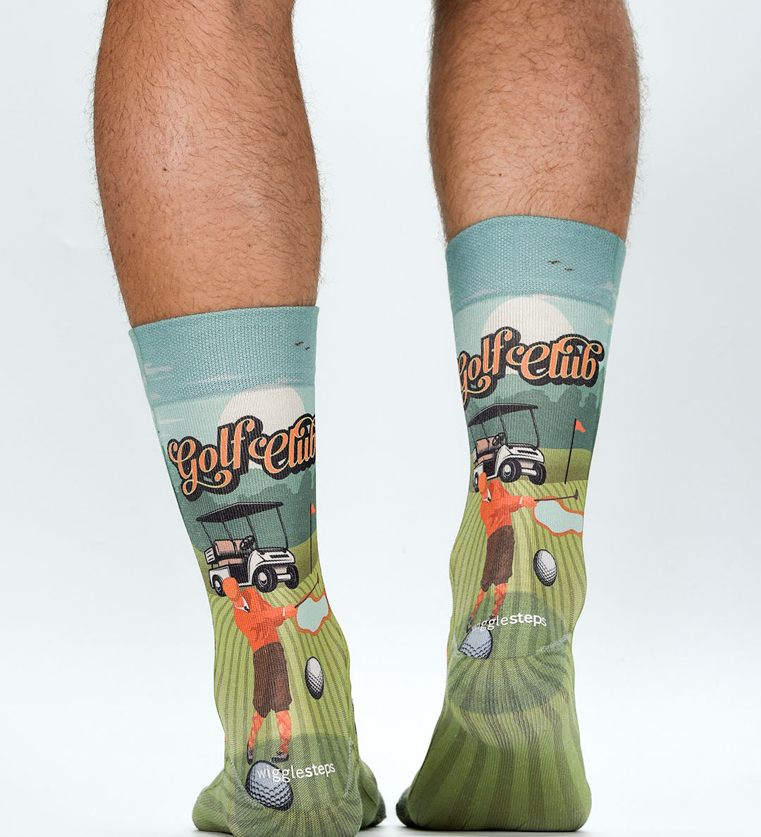 Golf-themed socks with a golf club and cart design on a white background