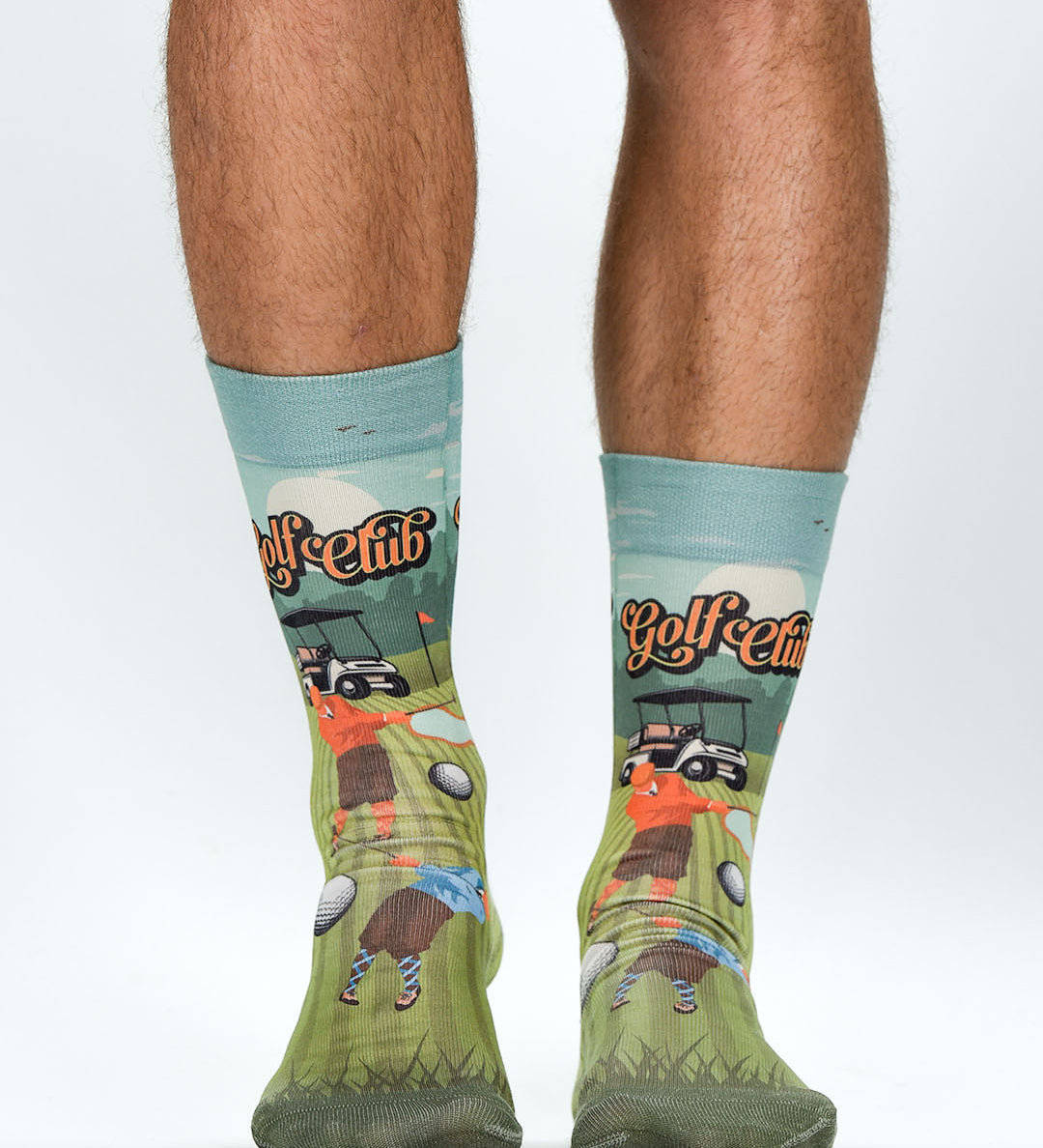 Golf-themed socks with cartoon raccoons playing golf on a white background
