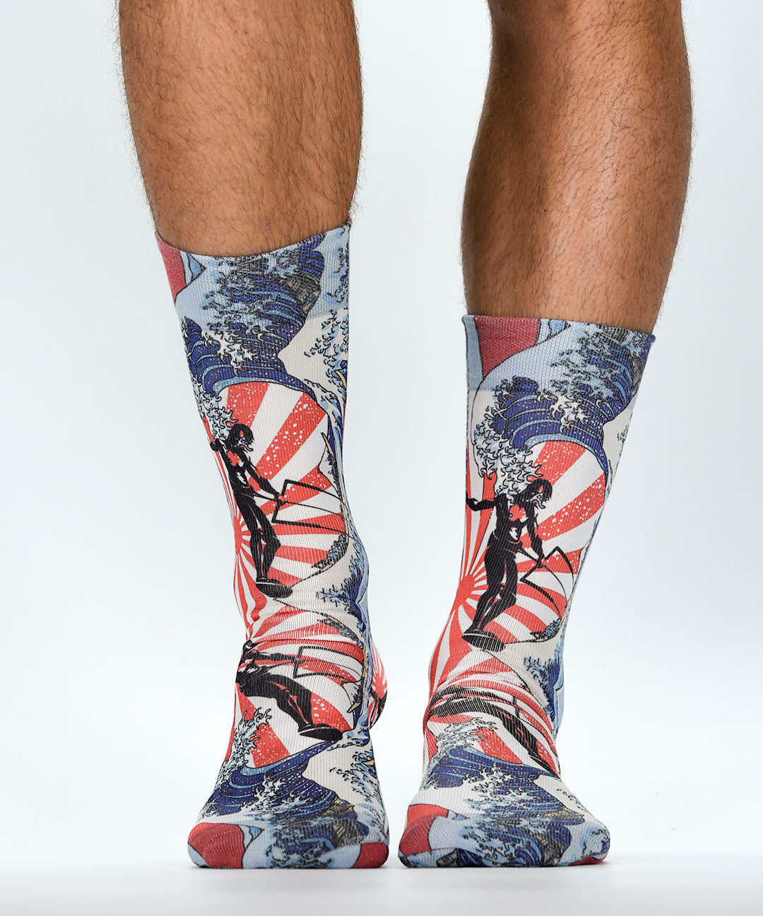 Colorful socks with a design of people on a white background