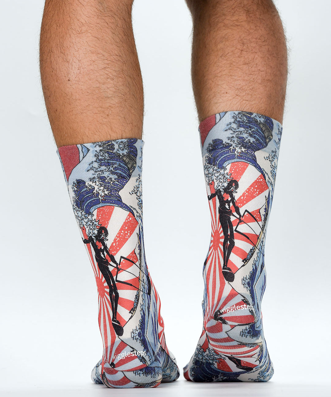 Colorful socks with vintage-style designs on a white background