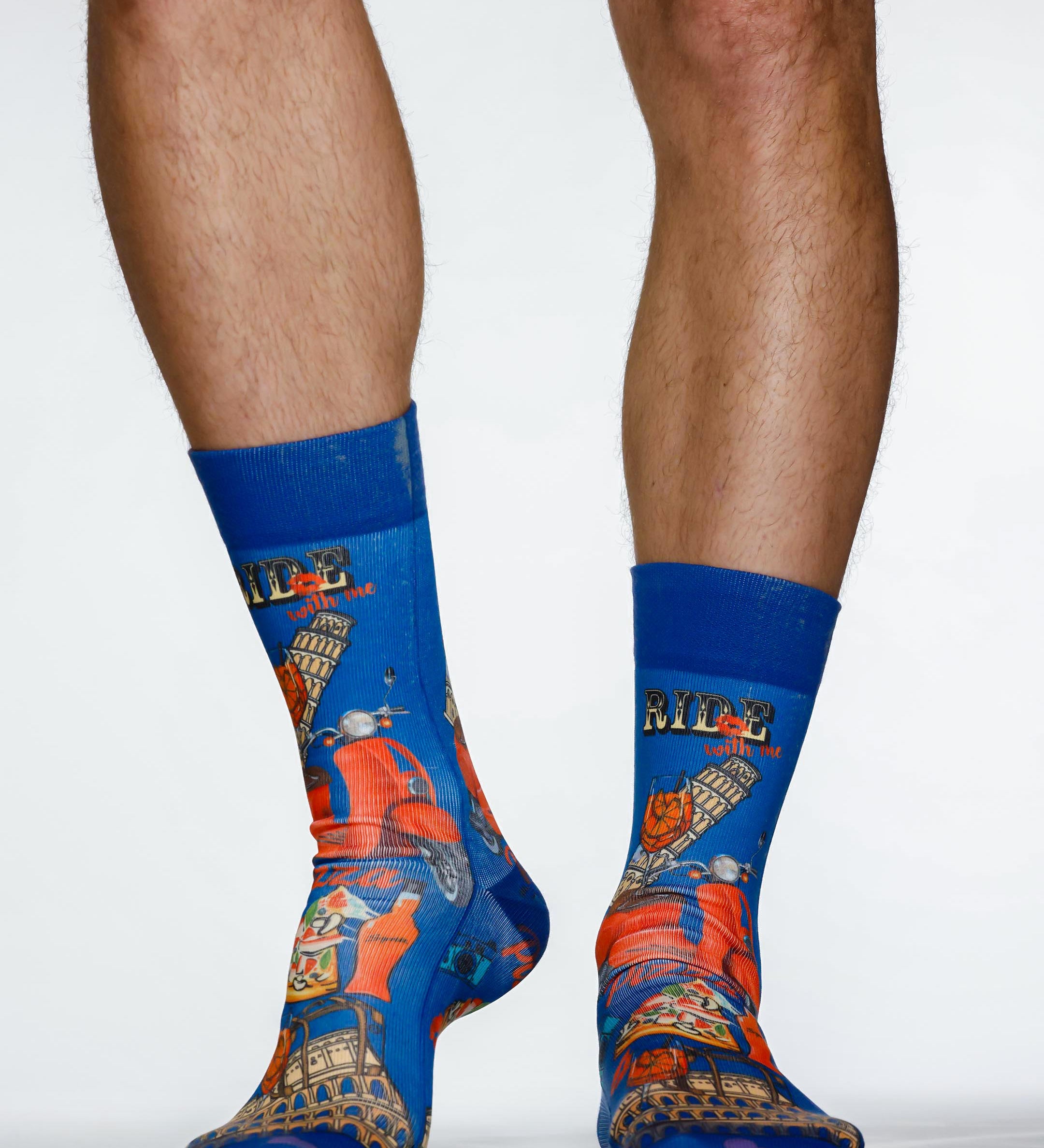 Blue socks with colorful designs on a white background