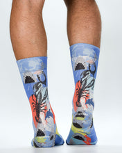 Colorful socks with abstract designs on a white background