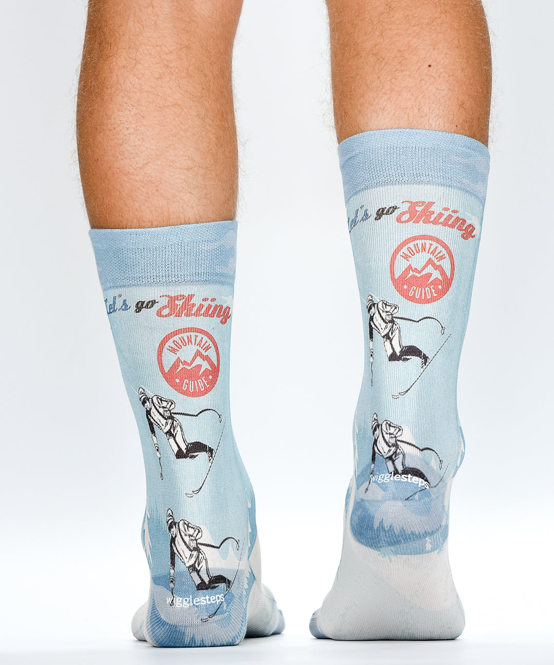 Light blue socks with skiing design and 'Go Skiing' text on a white background