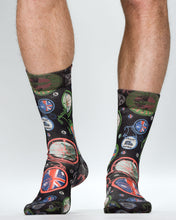 Socks with British-themed design featuring Union Jack and iconic symbols on a plain background