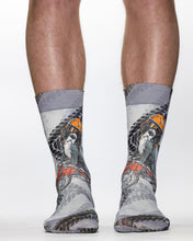 Gray socks with a graphic design of a dog and text on a white background