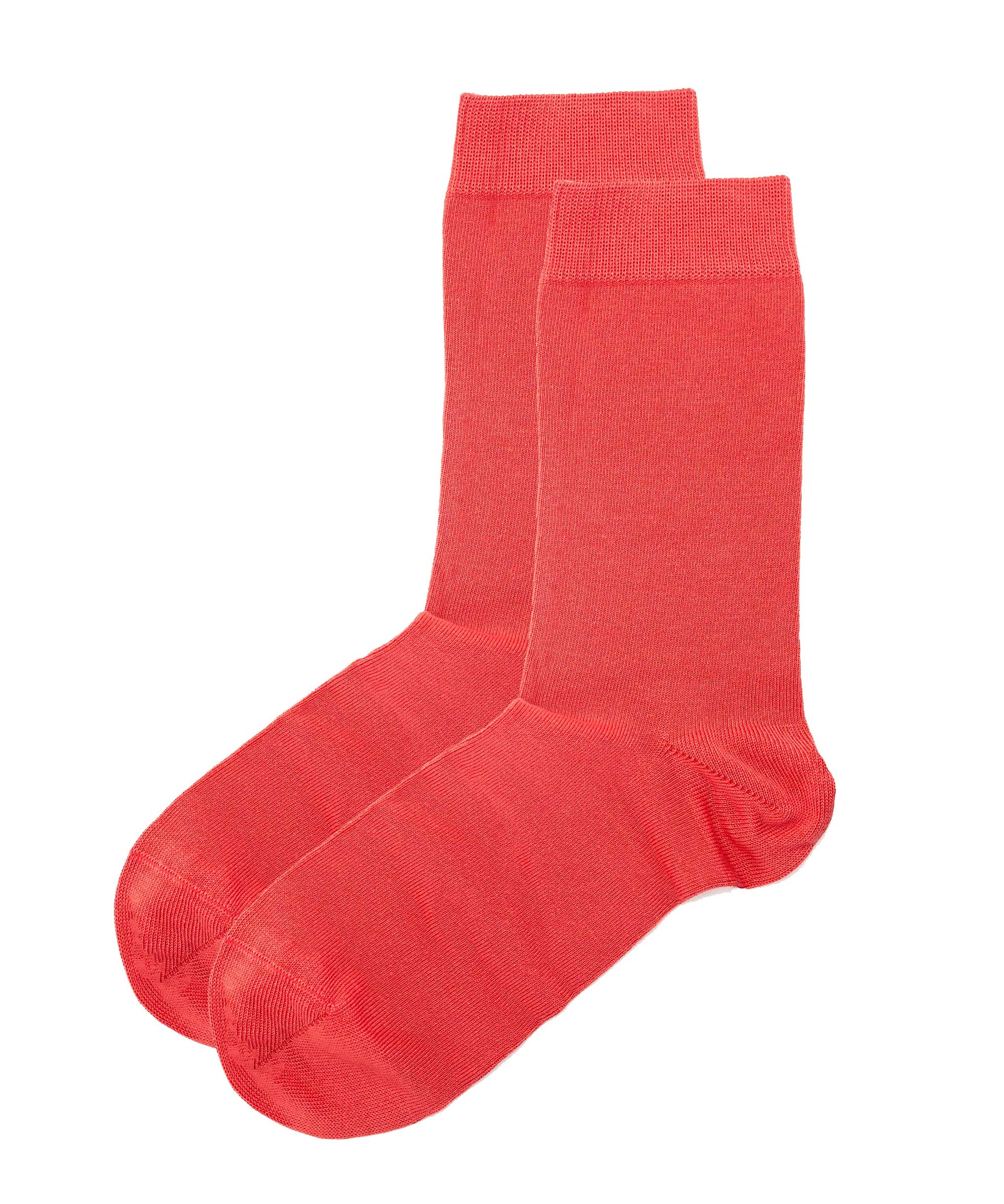 Pair of red dress socks on a white background