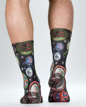 Socks with British-themed design worn by a person on a white background