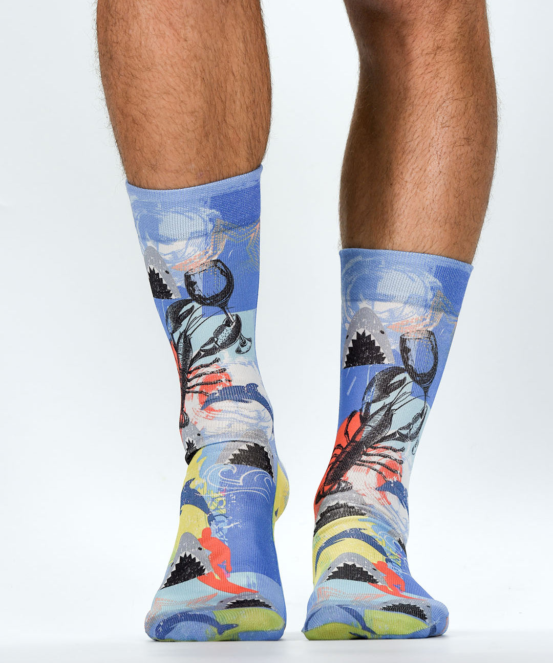 Colorful socks with a design of a person holding a flag on a white background